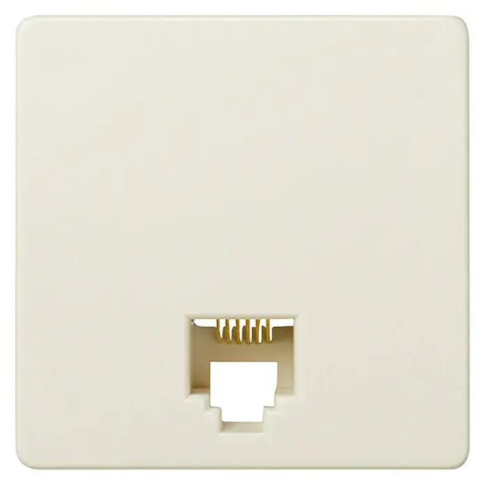 Simon 27 Toma de teléfono - x 1, Marfil, Mate, Montaje en superficie - Primer plano de una placa de pared telefónica RJ11 blanca con contactos dorados. Ideal para conexiones telefónicas domésticas.