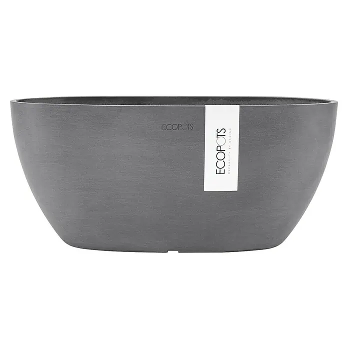Ecopots Sofia Pflanzschale rund Oval - Grau - Grauer Ecopots Pflanzkübel in länglicher Form mit dem Ecopots-Logo auf einem weißen Etikett. Robuster und stilvoller Pflanzbehälter.
