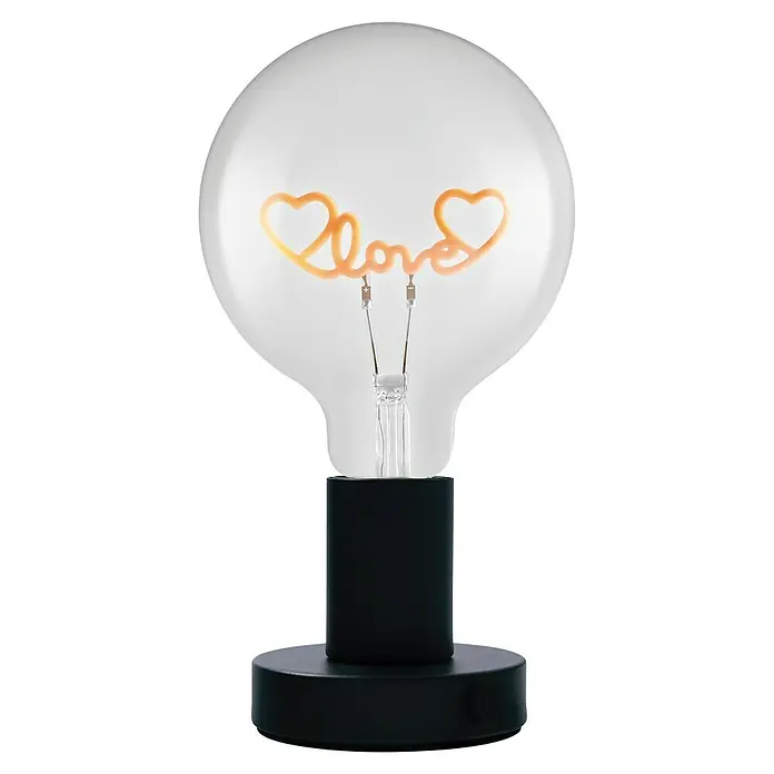 Ledvance Lámpara de sobremesa LED redonda Love - Ø x Al: 12,5 x 23,1 cm, Negro, Blanco cálido - Foto decorativa de una lámpara de mesa con una bombilla que muestra la palabra "amor" en forma de filamento, sobre una base negra elegante.