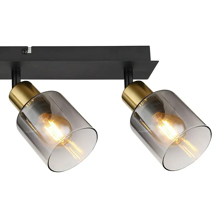 Globo Deckenstrahler Hollsy - 25 W, L x B x H: 550 x 80 x 180 mm, Schwarz, E14 - Nahaufnahme von zwei stilvollen Strahlern mit goldenen Akzenten und klaren Glasschirmen, die ein warmes Licht ausstrahlen.
