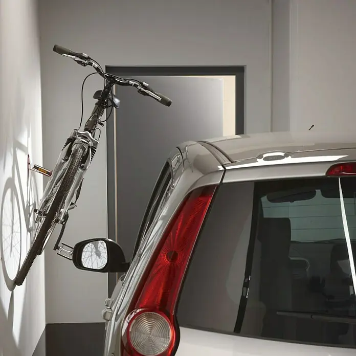 Mottez Gancho de pared para bicicletas B215V - Acero - Bicicleta en soporte de pared en un garaje junto a un coche, solución de ahorro de espacio.