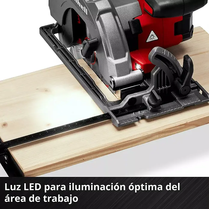 Einhell PXC 18V Sierra circular de batería TE-CS 18/165-2 Li - 18 V, Sin batería, Diámetro hoja de sierra: 165 mm, 4.200 r.p.m. - Detalle de una sierra circular Einhell con iluminación LED sobre una tabla de madera, para cortes precisos.