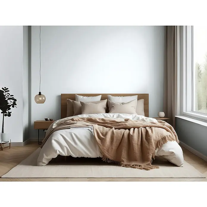 Bruguer Elegance Pintura para paredes - Gris neutro, Mate, 4 l - Acogedora habitación con elegante cama de madera, almohadas claras y una manta cálida. Perfecto para noches de descanso y un ambiente acogedor.