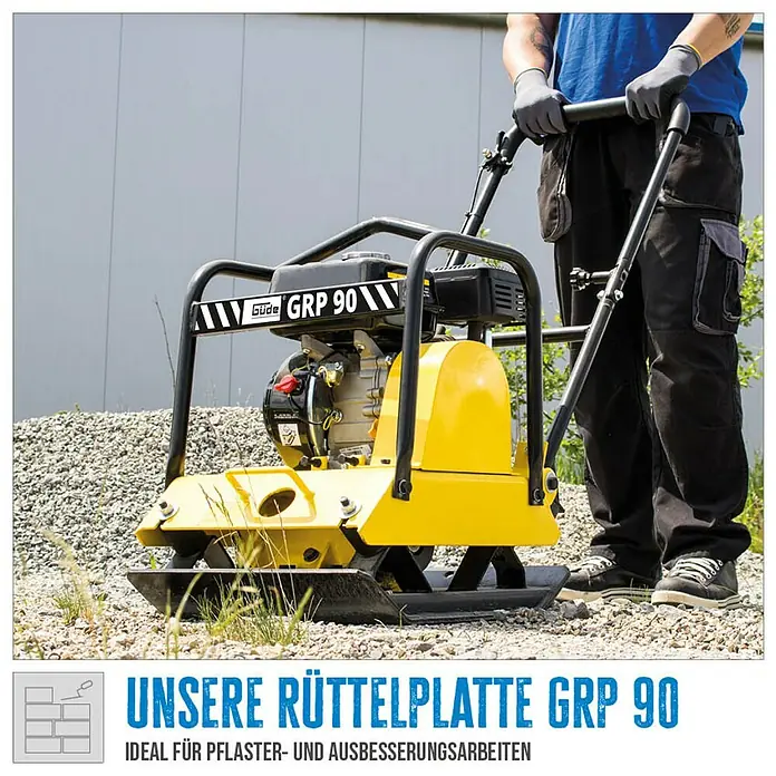 Güde Rüttelplatte GRP 90 - 4,1 kW, Verdichtungsdruck: 16 kN - Bild einer gelben GÜDE Rüttelplatte GRP 90 bei Pflaster- und Ausbesserungsarbeiten. Ideal für Verdichtungsarbeiten im Garten- und Landschaftsbau.