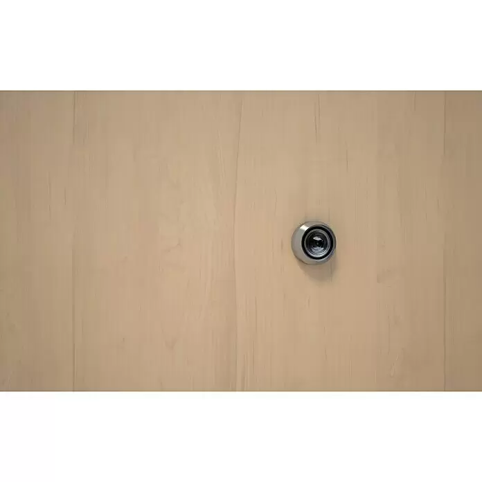 Abus Mirilla TSP1216 - Plateado, Latón, Grosor de la puerta: 35 mm - 59 mm - Mirilla plateada en una puerta de madera clara, ofreciendo seguridad y visibilidad.
