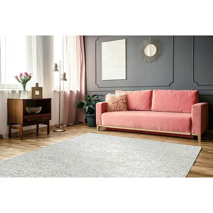 Kayoom Lederteppich Finish - Weiß, 290 x 200 cm, 100 % Leder - Ein stilvolles Wohnzimmer mit einem weichen, hellen Teppich, der den Raum optisch aufwertet und für eine angenehme Atmosphäre sorgt.