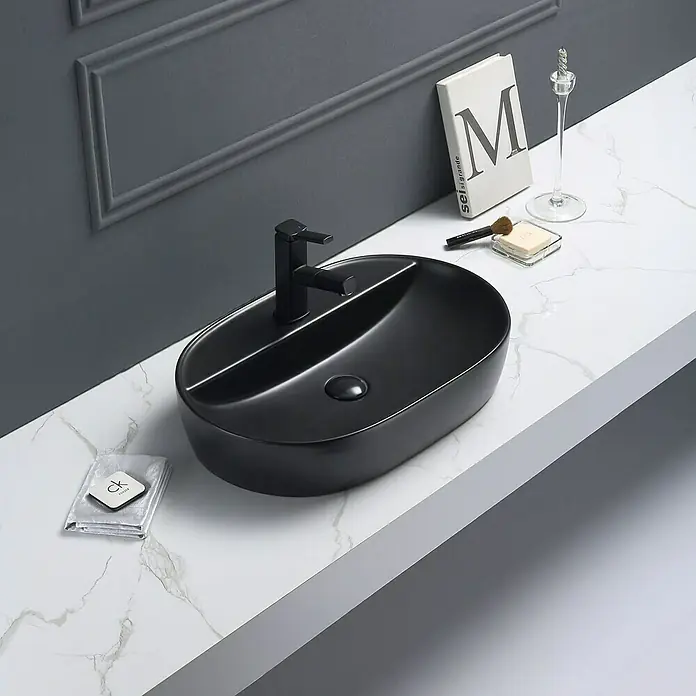 Sanicomfort Aufsatzwaschbecken Tari - 60 x 40 cm, Hahnloch: Mitte, Ohne Überlauf, Schwarz - Elegantes, modernes Waschbecken in Schwarz mit passender Armatur. Das ovale Design und die geteilte Innenfläche machen es zu einem Blickfang im Bad.