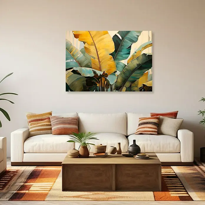 Lienzo Botánica 537 - Botánica, An x Al: 100 x 70 cm, 1 pzs. - Un elegante salón con un sofá color crema y una obra de arte llamativa que representa exuberantes hojas tropicales.