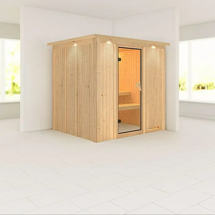 Karibu Elementsauna Daria - Ohne Ofen, Mit Dachkranz und Beleuchtung, L x B x H: 210 x 184 x 192 cm - Innenaufnahme einer hellen Holzsauna mit Glastür in einem hellen Raum, die das entspannende Saunaerlebnis hervorhebt.
