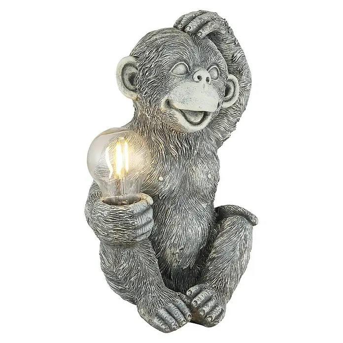 Globo Solar-Dekoleuchte Affe - Lichtfarbe: Warmweiß, LED, Höhe: 27,5 cm - Eine skurrile Tischlampe in Form eines Affen, der eine Glühbirne hält. Diese Lampe bringt einen Hauch von Humor in jeden Raum.