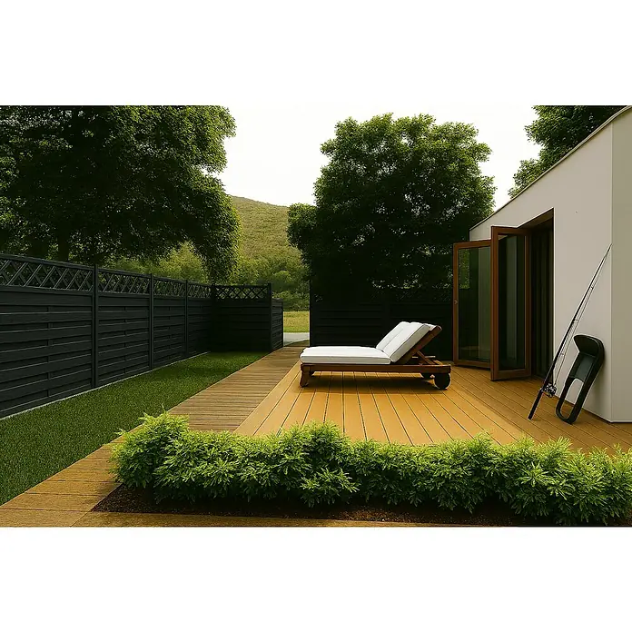 Andrewex Sichtschutzelement Hamburg - 90 x 180 cm, Anthrazit - Einladende Terrasse mit Sonnenliege und Angelrute vor einem modernen Haus mit Holzboden und gepflegtem Garten.