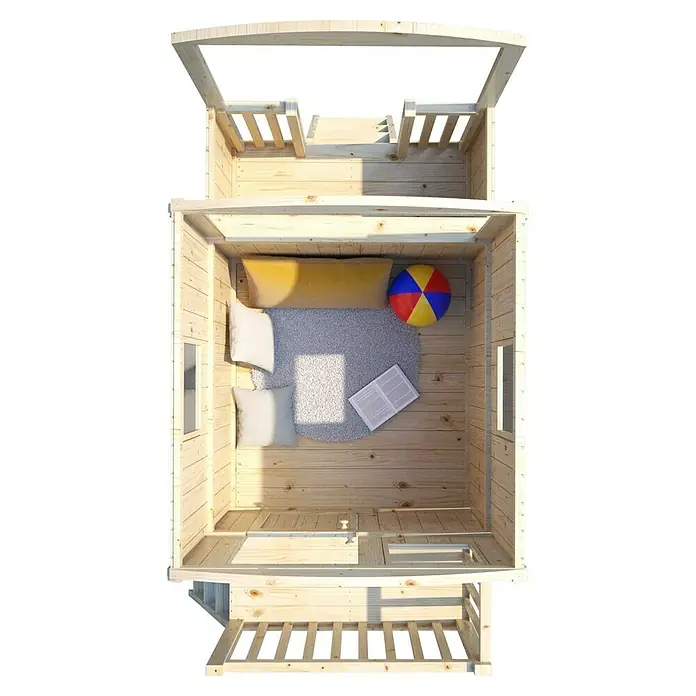 Soulet Spielhaus Carry - L x B x H: 262 x 155 x 203 cm, Holz - Ansicht von oben auf ein hölzernes Spielhaus mit Kissen, Decke und Spielzeug, das eine gemütliche und einladende Umgebung bietet.