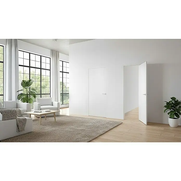 Entravia Drehtür-Komplettset Planara wandbündige Zarge - 760 x 2.010 mm, DIN Anschlag: Links/Rechts, Weiß lackiert, ähnlich RAL 9016, Röhrenspan - Einladender Wohnraum mit minimalistischen Türen, die sich nahtlos in das helle, moderne Interieur einfügen und für eine ruhige Atmosphäre sorgen.