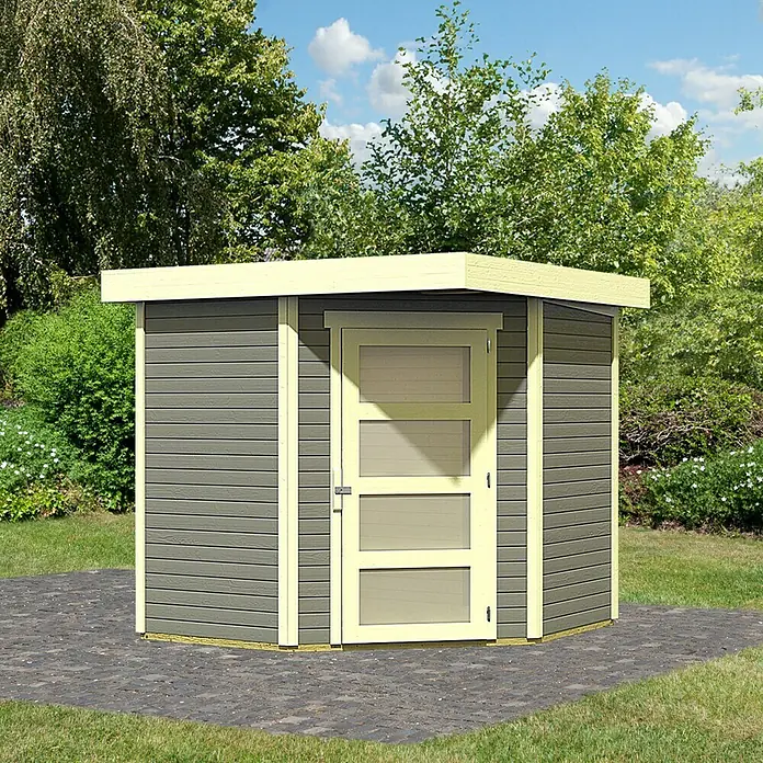 Karibu Gartenhaus Schwandorf 3 - Außenmaß inkl. Dachüberstand (B x T): 242 x 238 cm, Holz, Terragrau, Weiß - Das Bild zeigt ein Gartenhaus mit einer Tür und einem Flachdach, das auf einem gepflasterten Bereich steht.