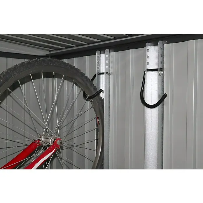 Floraworld Fahrradhalter - 2 Stk., Passend für: Floraworld Premium Systemhäuser - Detailansicht einer Fahrradaufhängung mit einem schwarzen Haken und einem roten Fahrradreifen in einer Garage oder einem Schuppen.