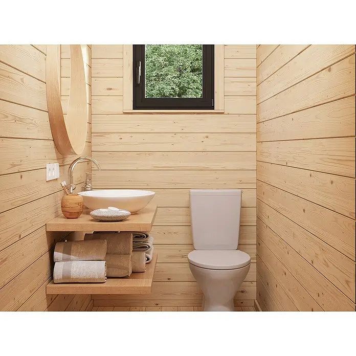 Palmako Gartenhaus Cecilia - Außenmaß inkl. Dachüberstand (B x T): 818 x 827 cm, Holz, Natur unbehandelt - Ein helles Badezimmer mit Holzvertäfelung, einem modernen Waschbecken und einer Toilette, die Komfort und Stil vereinen.