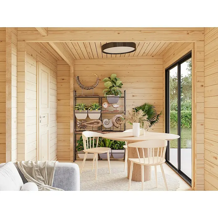 Palmako Gartenhaus Cecilia - Außenmaß inkl. Dachüberstand (B x T): 910 x 574 cm, Holz, Natur unbehandelt - Helles Esszimmer mit Holztäfelung, runden Holztisch und passenden Stühlen, dekoriert mit Pflanzen und natürlichen Elementen.