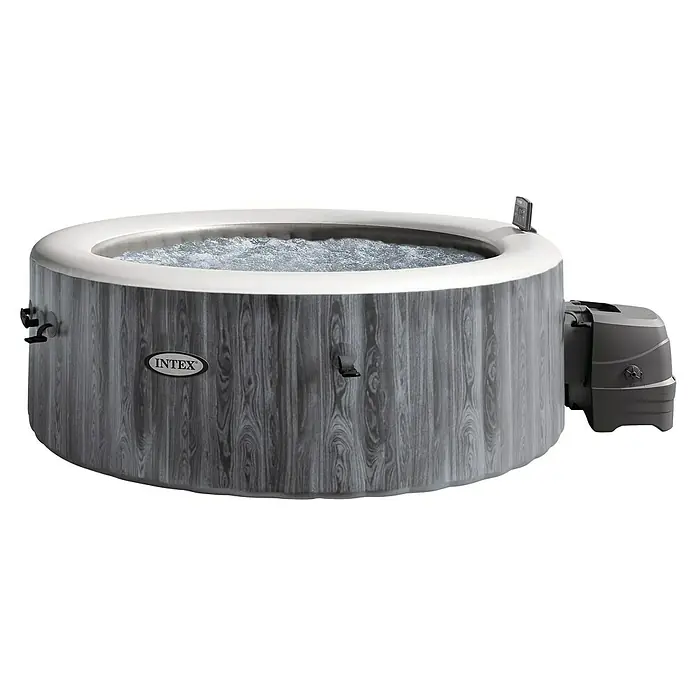 Intex Pure Spa Hidromasaje móvil Greenwood - Ø x Al: 196 x 71 cm, Gris/Blanco, 795 l - La imagen muestra un jacuzzi inflable Intex con acabado de aspecto de madera, panel de control integrado y agua en la piscina.