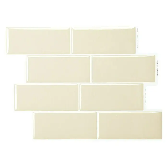 Smart Tiles Selbstklebemosaik Metro - 29,34 x 21,28 cm, Tripoli, Glänzend - Nahaufnahme von creme-farbenen U-Bahn-Fliesen, die ein modernes und elegantes Design für jeden Raum bieten.
