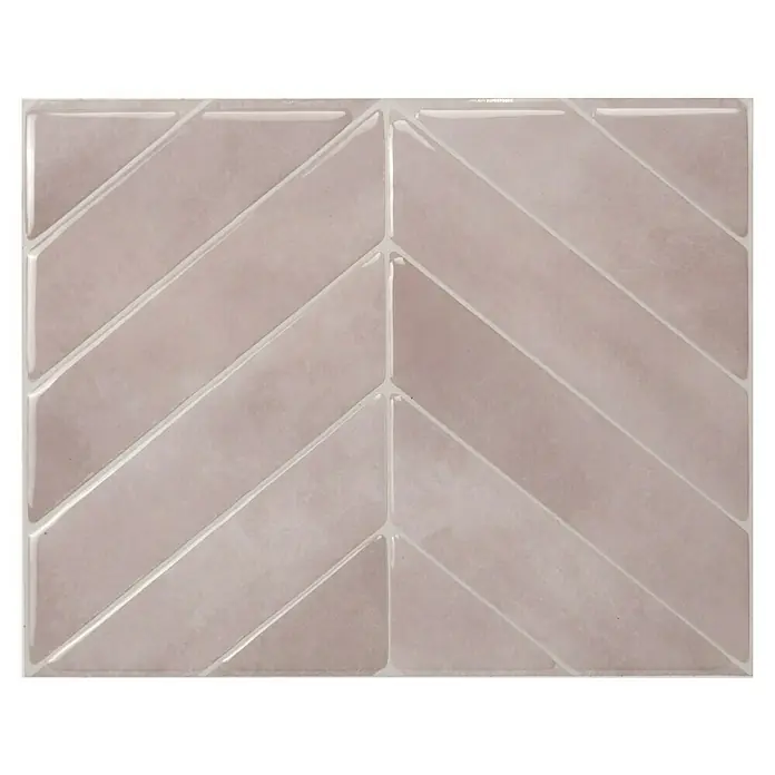 Smart Tiles Selbstklebemosaik Chevron - 29,02 x 22,86 cm, Viby, Glänzend - Nahaufnahme einer rosafarbenen 3D-Wandfliese mit einem Chevron-Muster und glänzenden weißen Fugen, perfekt für stilvolle Innenräume.