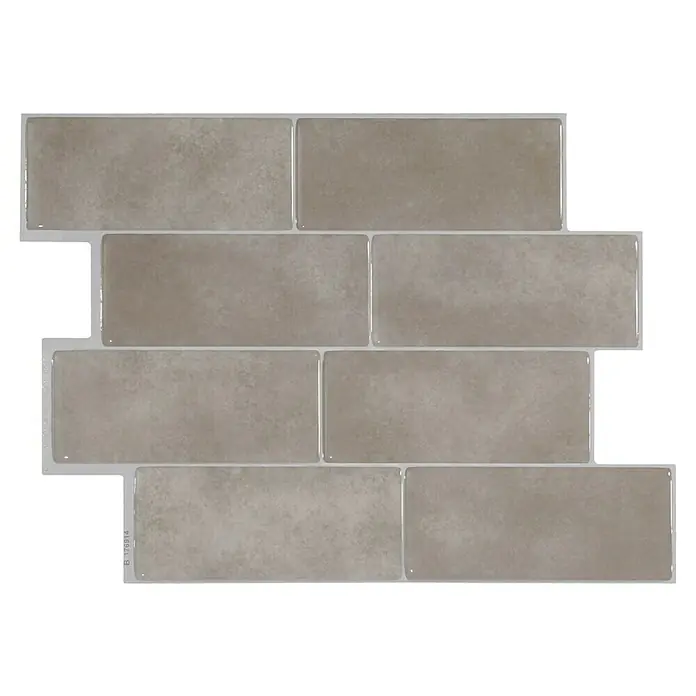 Smart Tiles Selbstklebemosaik Metro - 29,34 x 21,28 cm, Cologne, Glänzend - Nahaufnahme von einem Paneel mit beigen, rechteckigen Wandfliesen, die ein modernes und stilvolles Design für Innenräume bieten.