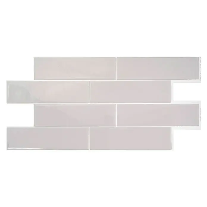 Smart Tiles Selbstklebemosaik Oslo - 57,31 x 27,62 cm, Grey, Glänzend - Detailaufnahme von hellen, rechteckigen Wandfliesen, die im versetzten Verband angeordnet sind und eine moderne Ästhetik vermitteln.