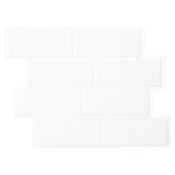 Smart Tiles Selbstklebemosaik Metro - 29,34 x 21,28 cm, Blanco, Glänzend - Nahaufnahme einer Wand mit weißen rechteckigen Metrofliesen. Die glänzende Oberfläche und die sauberen Fugen sorgen für ein modernes Aussehen.