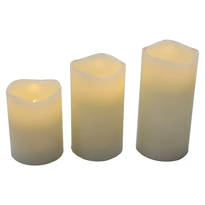 New Garden Lámpara de sobremesa LED redonda Vela Dolo - 0,54 W, Ø x Al: 15 x 15 cm, Blanco, Blanco cálido, 3 ud. - Esta imagen muestra un conjunto de tres velas LED de diferentes tamaños, emitiendo un brillo cálido y acogedor. Perfecto para crear un ambiente acogedor.