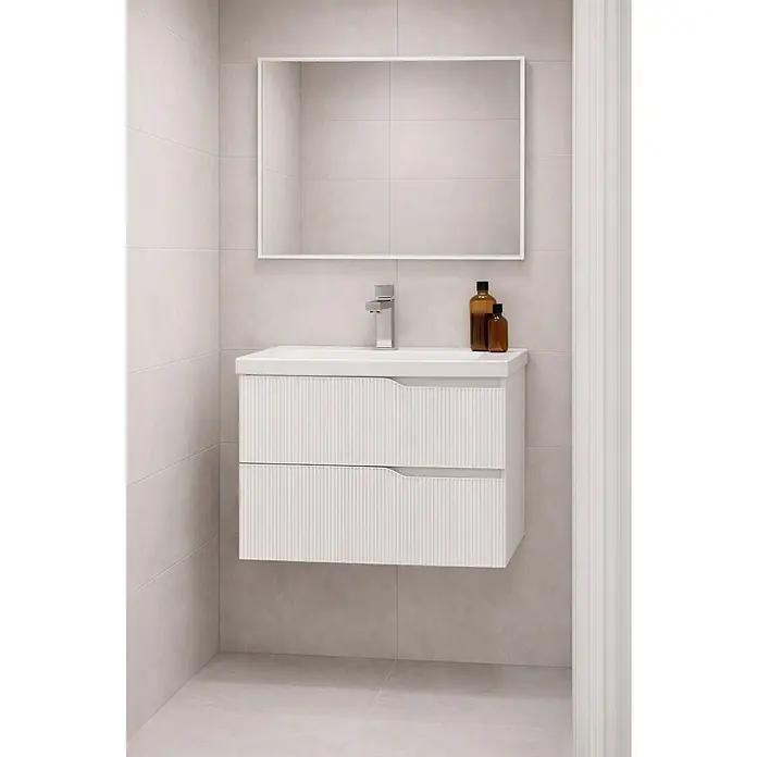 Futurbath Mueble de lavabo Marina - L x An x Al: 45 x 60 x 55 cm, Blanco, Melamina - Un tocador de baño con dos cajones en blanco y un espejo rectangular encima. La habitación presenta tonos de color neutros.