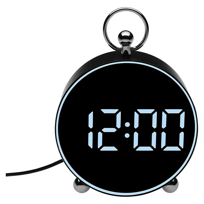 Versa Reloj despertador digital - An x Al: 4 x 13,3 cm, Negro - Imagen de un reloj digital negro y redondo que muestra la hora 12:00, con asa plateada.
