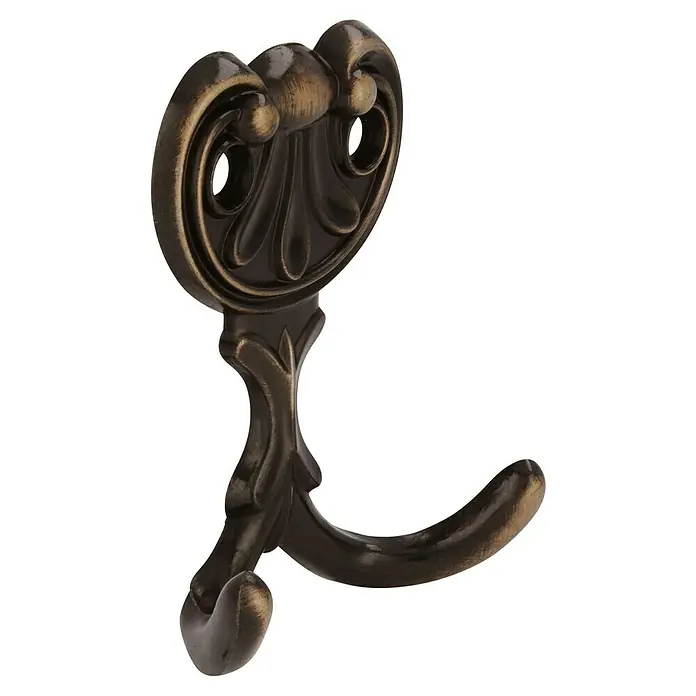 Siro Garderobenhaken - L x B x H: 56 x 66 x 20 mm, Anzahl Haken: 2 Stk., Messing antik - Nahaufnahme eines dekorativen, bronzefarbenen Wandhakens mit geschwungenen Elementen und antikem Finish für stilvolle Aufbewahrung.