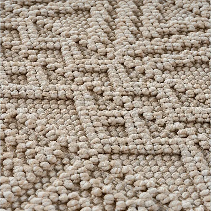 Flachgewebeteppich Helix 2202 - Beige, 200 x 140 cm, 100 % Polyester - Detailaufnahme eines beigen Teppichs mit gewebtem Muster. Die Textur und das Design des Teppichs sind gut erkennbar.