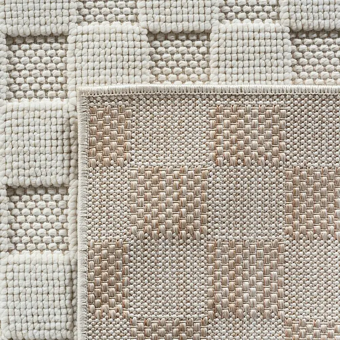 Flachgewebeteppich Helix 2203 - Creme, 340 x 240 cm, 100 % Polyester - Nahaufnahme eines strukturierten Teppichs mit geometrischem Muster in neutralen Farbtönen, ideal für moderne Wohnräume.