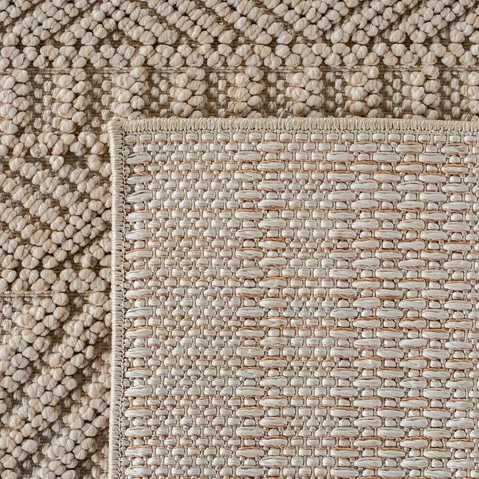 Flachgewebeteppich Helix 2202 - Beige, 200 x 140 cm, 100 % Polyester - Nahaufnahme eines beigen Teppichs mit unterschiedlichen Webmustern, der eine interessante Texturkombination zeigt.