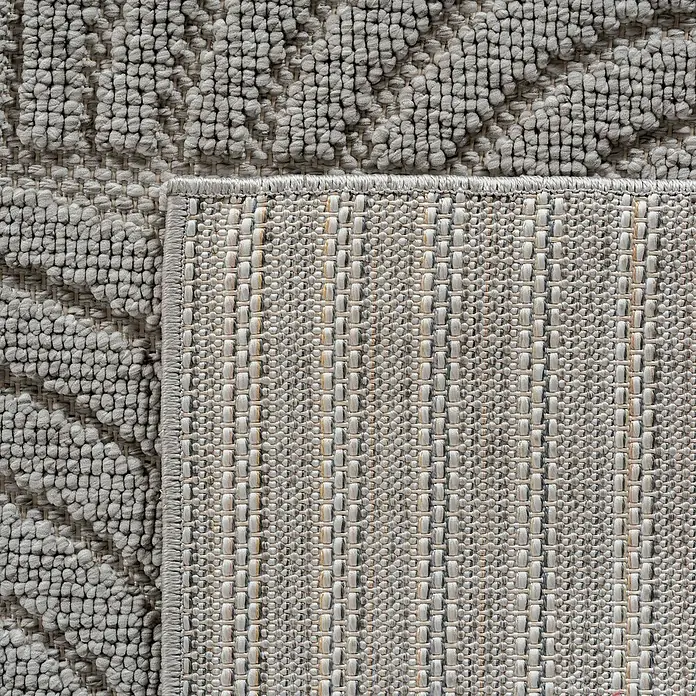 Flachgewebeteppich Helix 2201 - Silber, Durchmesser: 80 cm, 100 % Polyester - Nahaufnahme eines grauen Teppichs mit gewebter Textur und einer Bordüre, die ein subtiles geometrisches Muster zeigt.
