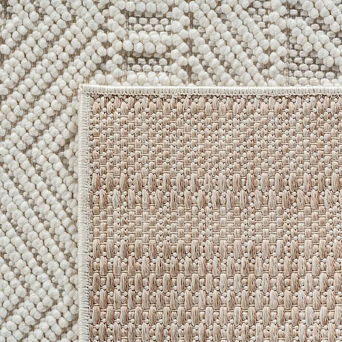 Flachgewebeteppich Helix 2202 - Creme, 250 x 80 cm, 100 % Polyester - Nahaufnahme eines beigen Teppichs mit aufwendigem Webmuster, der seine Textur und Handwerkskunst hervorhebt.