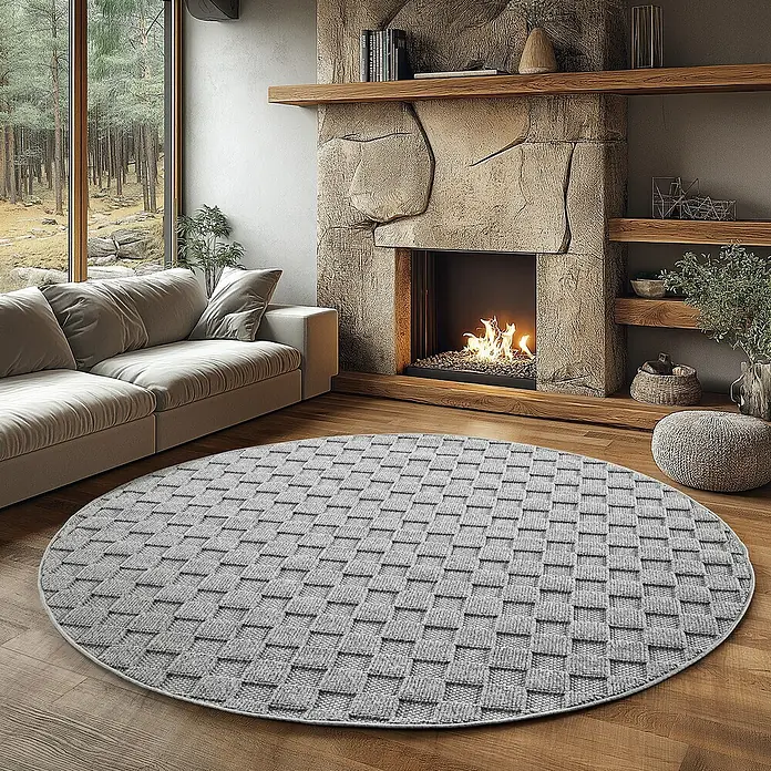 Flachgewebeteppich Helix 2203 - Silber, Durchmesser: 200 cm, 100 % Polyester - Bild einer runden Wohnzimmerteppich mit geometrischem Muster in einem gemütlichen Wohnzimmer mit Kamin und Couch.