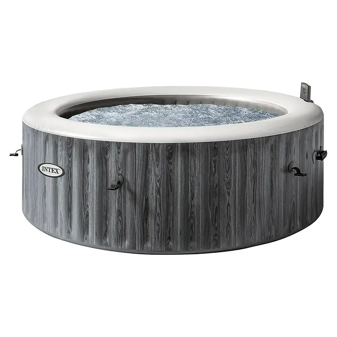 Intex Pure Spa Hidromasaje móvil Greenwood - Ø x Al: 216 x 71 cm, Gris/Blanco, 1.098 l - Primer plano de un jacuzzi Intex con un diseño de vetas de madera y agua burbujeante en el interior.