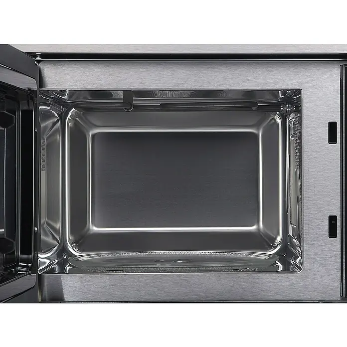 Respekta Einbau-Mikrowelle Nadia MW800 - Max. Leistung: 800 W, 20 l, Silber - Sauberer, leerer Innenraum einer Edelstahl-Mikrowelle mit Glasdrehteller.