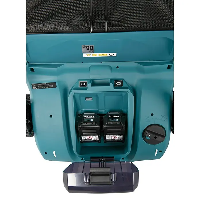 Makita XGT 40V max. Akku-Vertikutierer UV001GZ - Anzahl Akkus: Ohne Akku, 40 V, Arbeitsbreite: 38 cm - Offenes Batteriefach eines türkisfarbenen Elektrowerkzeugs mit zwei eingelegten schwarzen Makita Li-Ion Akkus.