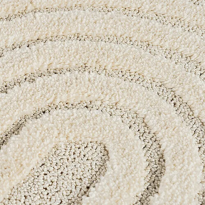 Kurzflorteppich Art 1122 - Creme, 250 x 80 cm, 100 % Polypropylen - Nahaufnahme eines cremefarbenen Teppichs mit erhabenen flauschigen Spiralmustern.