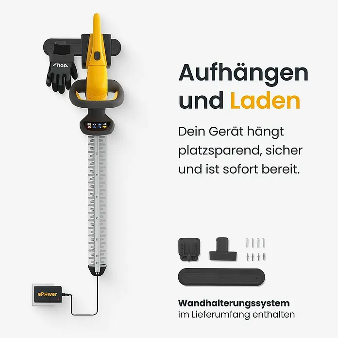 Stiga Akku-Heckenschere HT 300E - 2 Akkus, Schnittlänge: 54 cm - Gelbe und schwarze Heckenschere hängt an einer schwarzen Wandhalterung, lädt an der Steckdose. Komponenten des schwarzen Wandhalterungssystems sind gezeigt.