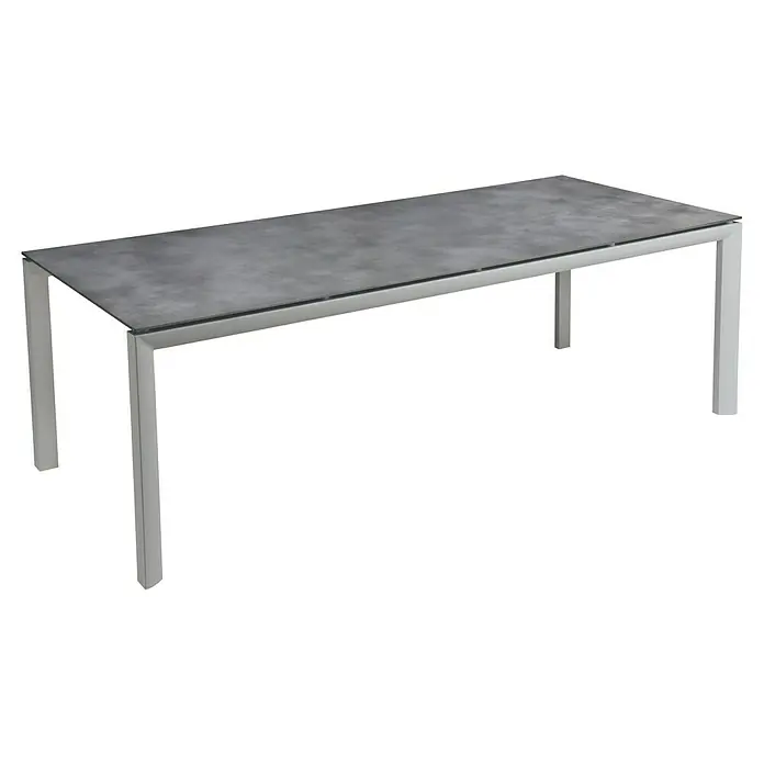 Grosfillex Gartentisch Greggia - L x B x H: 220 x 95 x 74,5 cm, Aluminium, HPL, Grau - Rechteckiger Esstisch mit grauer Betonoptik-Tischplatte und silbernen Metallbeinen.