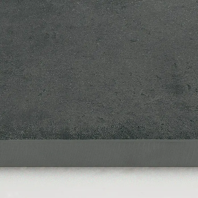 DryTile Feinsteinzeugfliese Studio Asphalt - 30 x 60 cm, Anthrazit, Matt - Dunkelgraue, texturierte Oberfläche mit einer sauberen, glatten Kante.