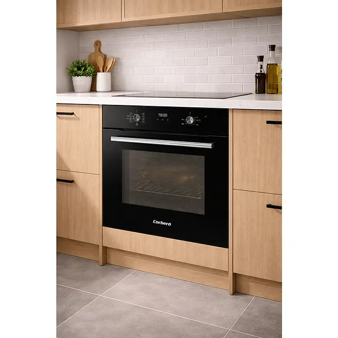 Corberó Horno empotrado CCHMT905 - Número de tipos de calentamiento: 8 ud., Volumen horno: 70 l, Negro - Horno empotrado negro Corberó con asa plateada y pantalla digital, integrado en una cocina moderna.