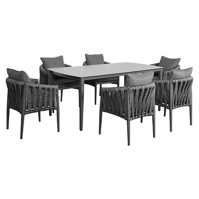 Gartentisch - L x B x H: 180 x 90 x 74 cm, Aluminium, Keramik, Rechteckig, Anthrazit, inklusive Schutzhülle - Graues Outdoor-Essgruppe mit rechteckigem Tisch und sechs Stühlen mit geflochtenen Rückenlehnen und Kissen.