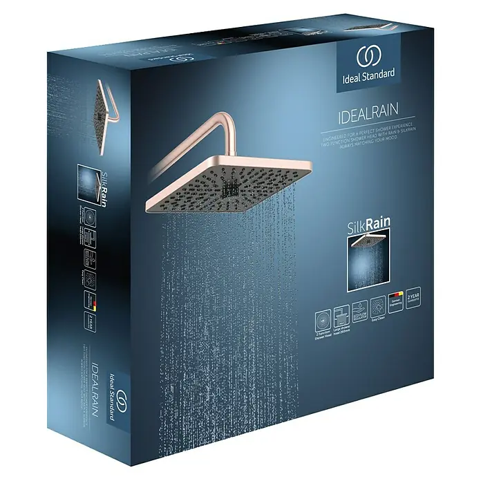 Ideal Standard Alu+ Kopfbrause Idealrain - B x L: 260 x 260 mm, 12 l/min, Rosé - Roségoldene Ideal Standard IDEALRAIN Brausekopf-Verpackung, zeigt eine quadratische Regendusche mit fließendem Wasser.