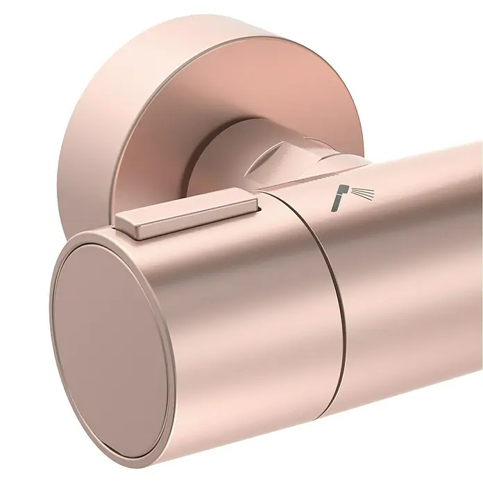 Ideal Standard Alu+ Duschsystem Ceratherm - Anzahl Strahlarten: 2 Stk., Rosé - Roségoldene Duscharmatur mit rechteckigem Knopf und Brausesymbol.