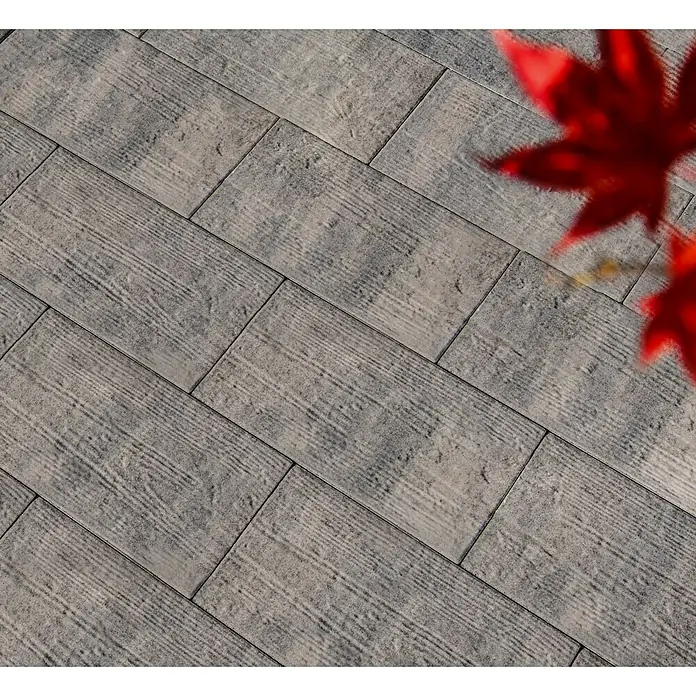 Diephaus Terrassenplatte Norwood - 60 x 30 x 4 cm, Terra, Beton - Graue Pflastersteine mit ausgeprägter Holzmaserung, diagonal verlegt.