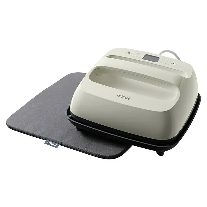 Cricut Transferpresse EasyPress SE + Hitzeschutzmatte - 22,5 x 22,5 cm, Passend für: Bügelfolien - Creme-farbene Cricut EasyPress 3 Heizpresse mit einer dunkelgrauen hitzebeständigen Matte.